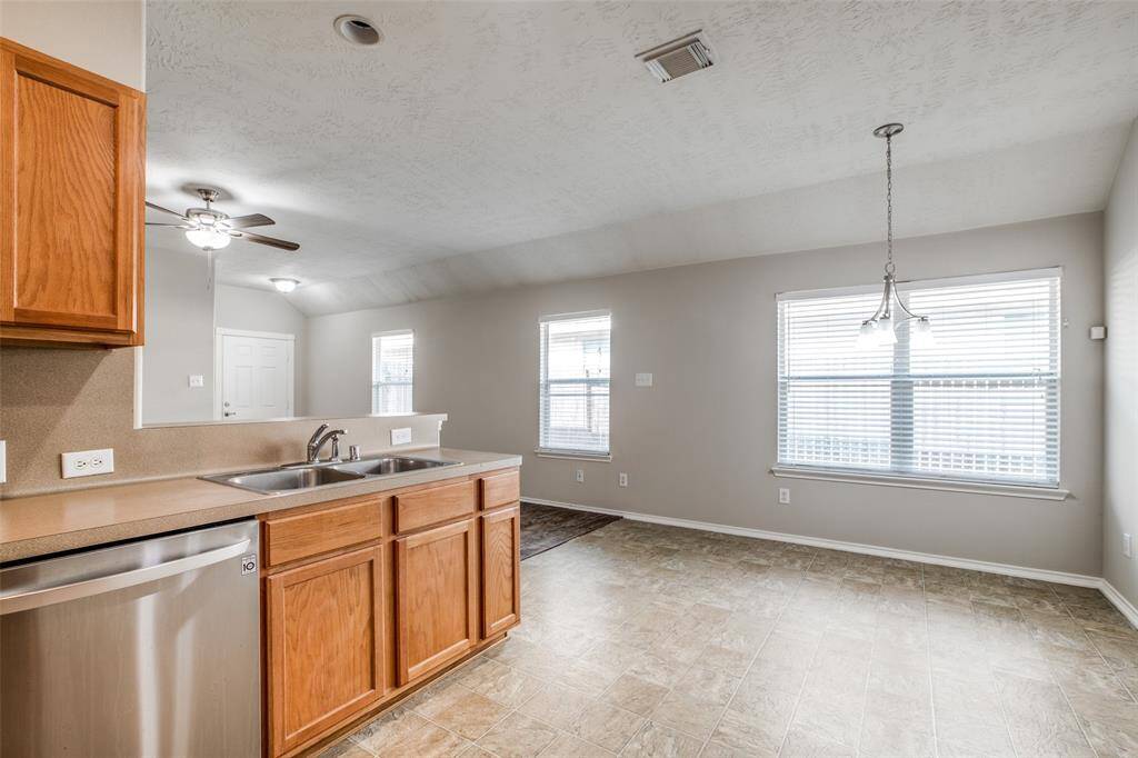 Dining area has a new light fixture.