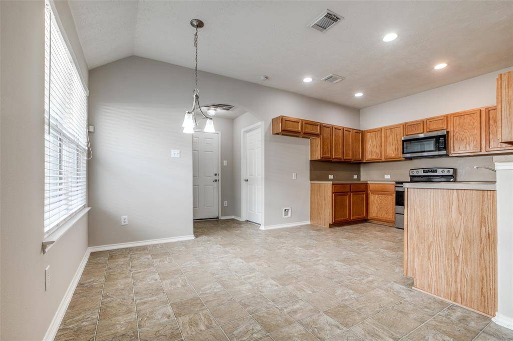 in this view you can see the door on the right that leads to the primary bedroom.