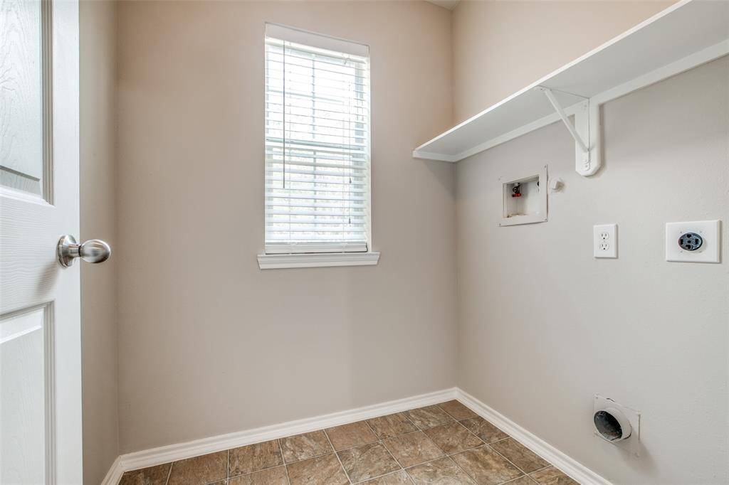 Utility room located at the front of the house.