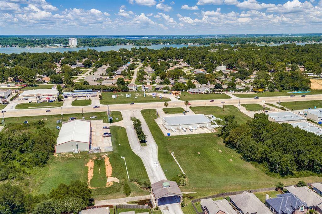 Aerial view showing how close the neighborhood is to Lake Conroe.