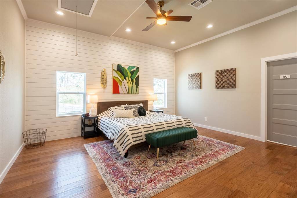 The primary suite has an abundance of space and a luxurious en suite bathroom.