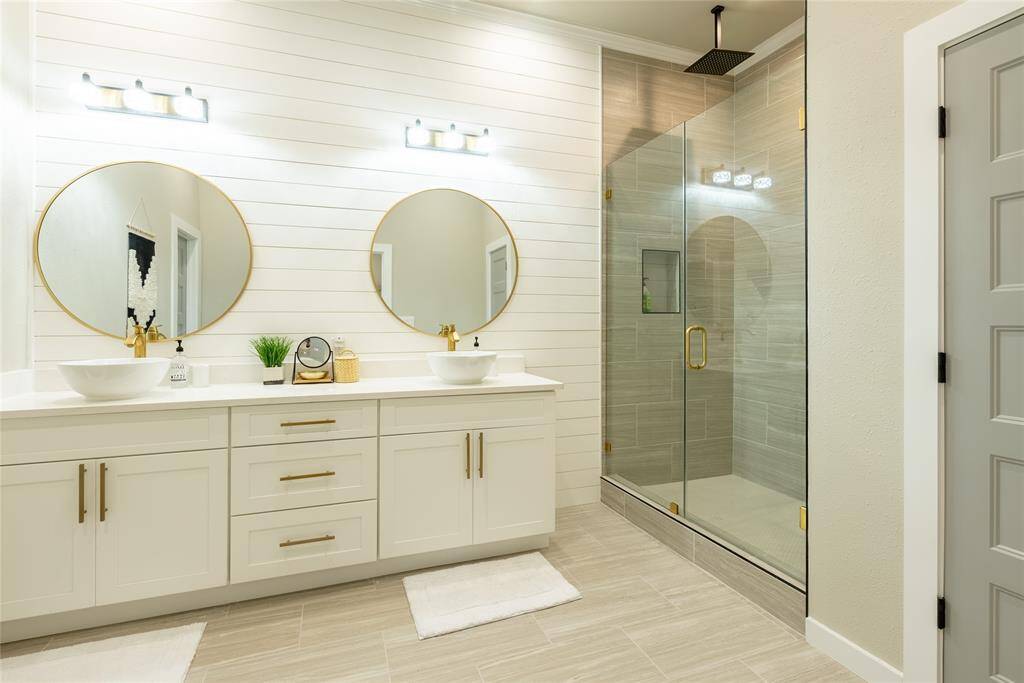 The luxurious primary en suite bathroom is a must see!!