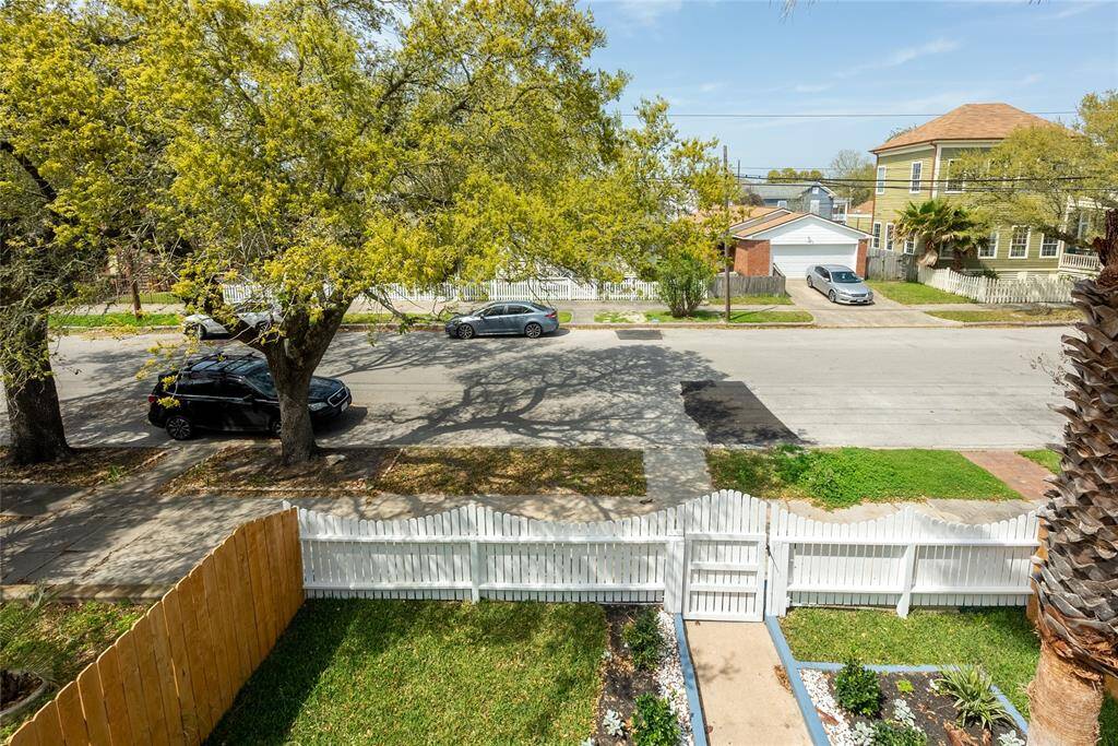 Pets and children can enjoy running around the gated front yard.
