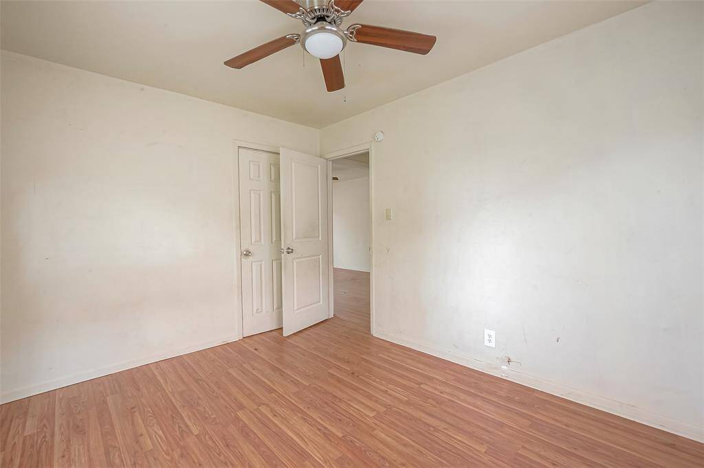 The living area leading to the bedroom.