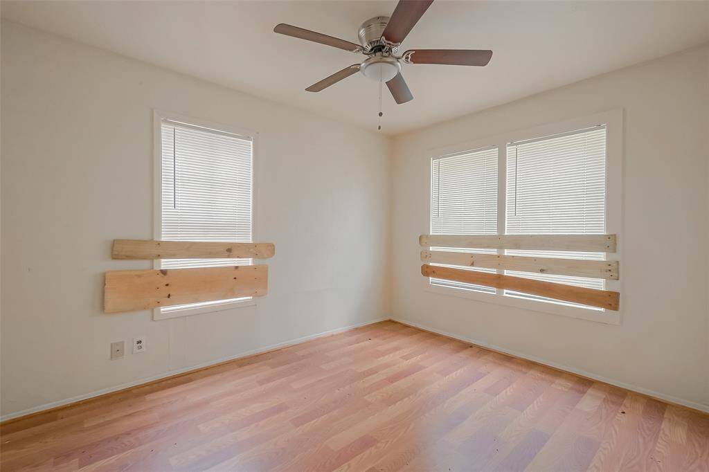 The ceiling fan provides a soothing breeze, creating a pleasant ambiance for relaxation or a restful night's sleep.