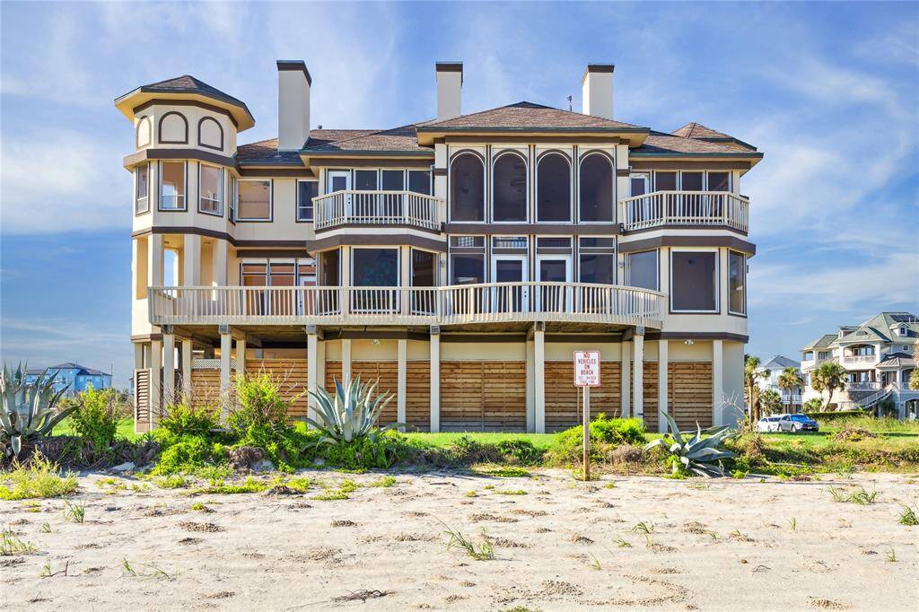 The SANDcastle beach house with wraparound balconies.