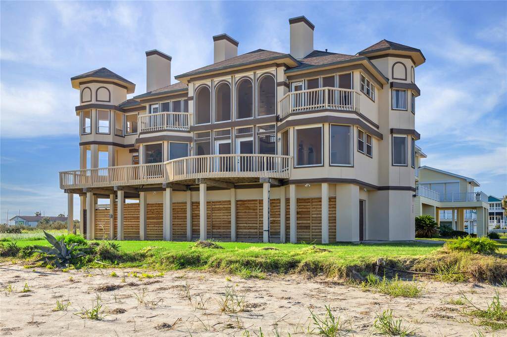 The Sandcastle beach house with wraparound balconies.
