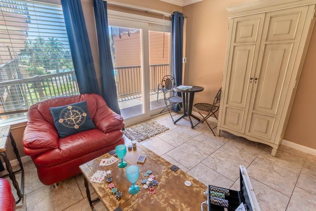 The primary bedroom also has sliding doors to the balcony