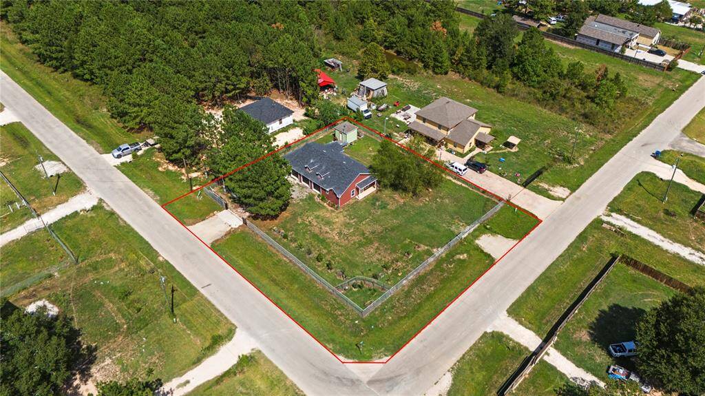 Another arial view of the 1/2 acre lot. Call and schedule your private showing.