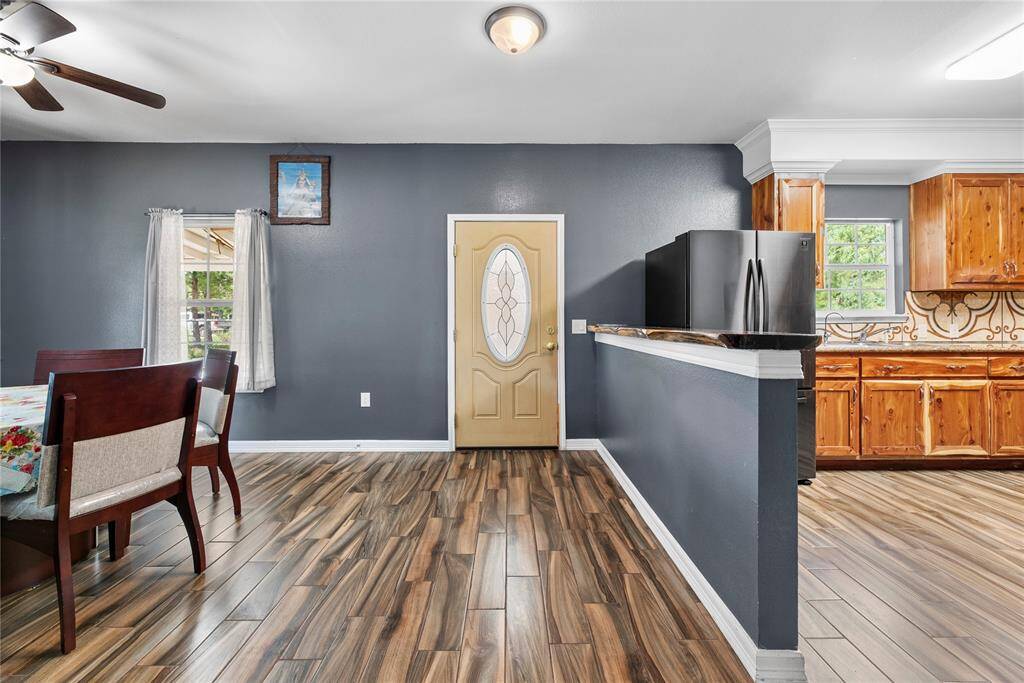 Gorgeous easy care wood-look tile flooring throughout.