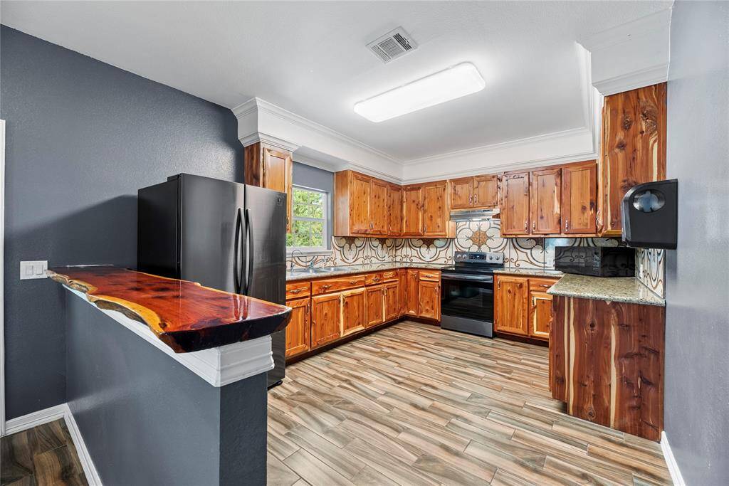 To the left of the entry is the kitchen.