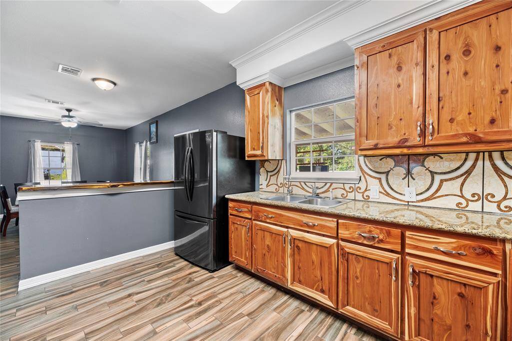 You'll love this space with beautiful granite counters and lots of cabinet space.