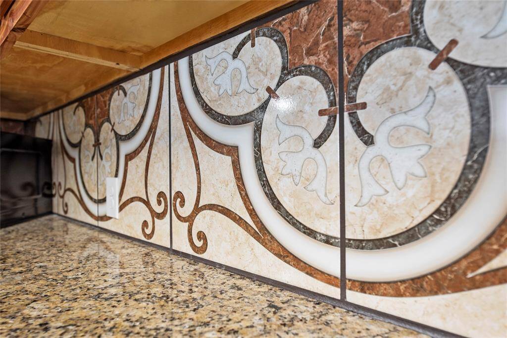 Designer tiled backsplash.
