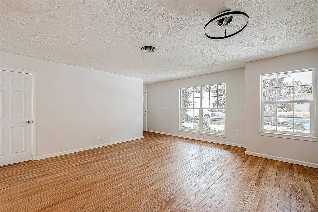ANOTHER VIEW OF THE FAMILY ROOM.