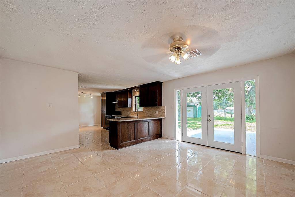 THE DINING AREA IS OPEN TO THE KITCHEN.