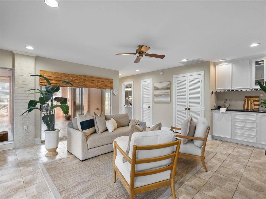 Downstairs flex space with wet bar