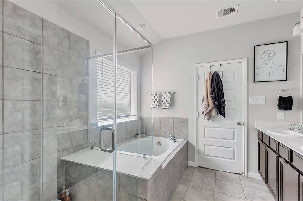 A second view of the primary bathroom.