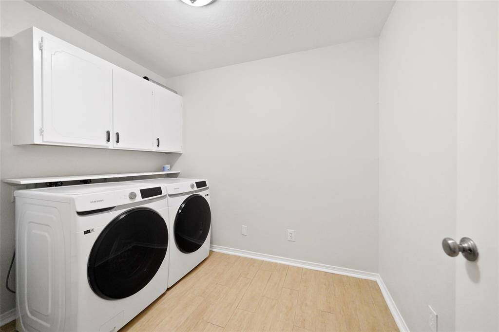 Laundry room, washer and dryer included in the sale