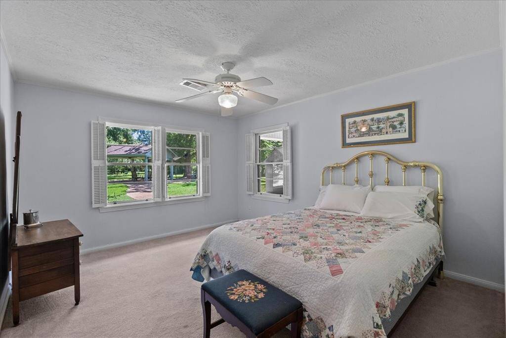 Indulge in restful nights and sweet dreams in this welcoming downstairs bedroom, designed for ultimate comfort and relaxation.
