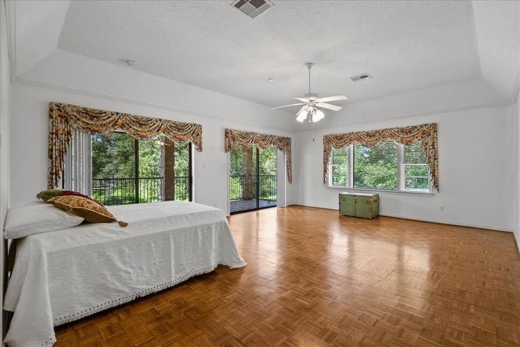 Not only spacious, but this primary bedroom also features a private balcony, perfect for savoring morning coffee or afternoon tea in serene seclusion.