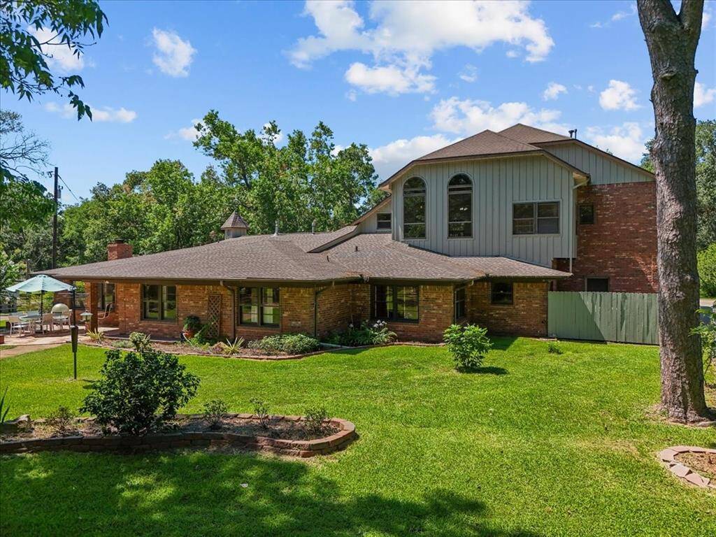 "Secluded serenity: This home offers spacious living, a huge yard, and a tranquil place among nature with no close neighbors."