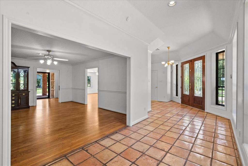 Experience a sense of spaciousness that welcomes you as you step into this foyer.