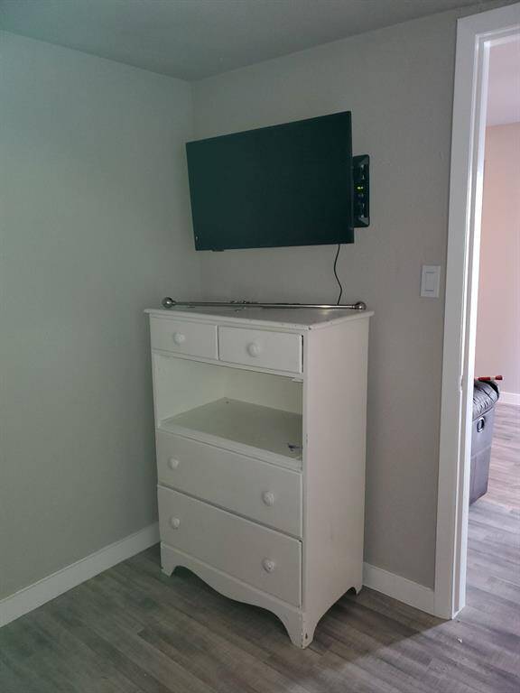 Unit 3 - secondary room, wall mounted TV