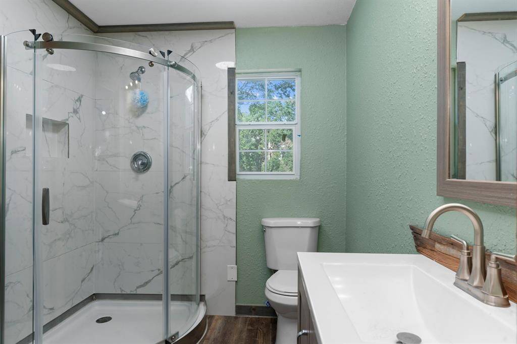 Guest Bathroom with Beautiful Tile Surroundings!