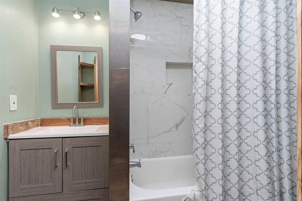 The Primary Bathroom has Tub and shower combination!