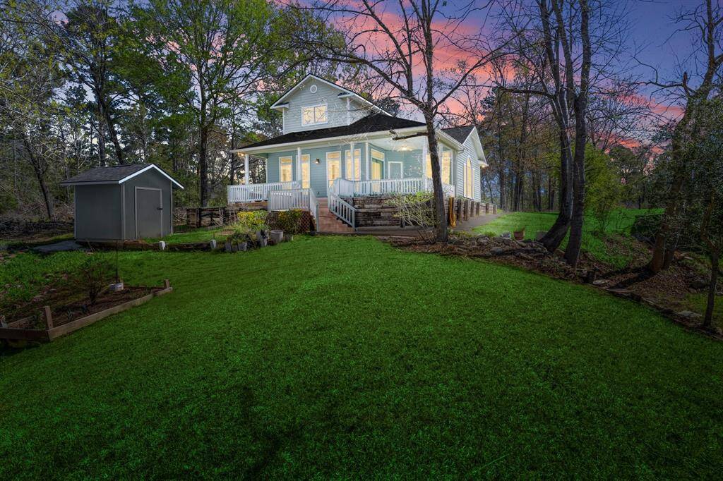 This dreamy water front home is perfect for those who love nature, adventure, and peaceful water front living!