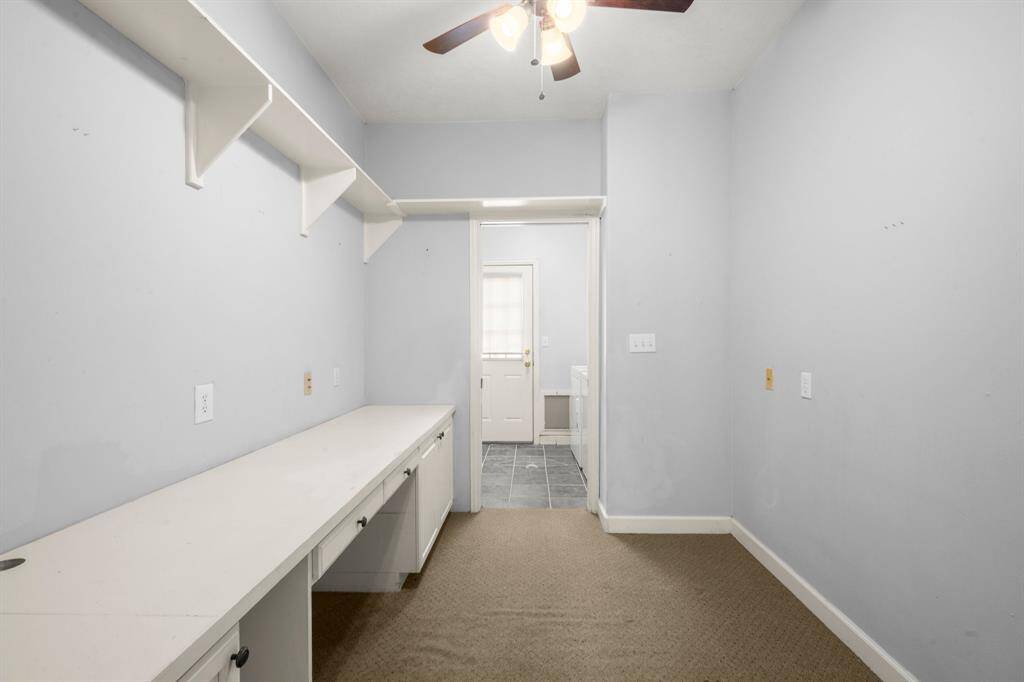 Office With Built-in Desk and Lots of Work Space.