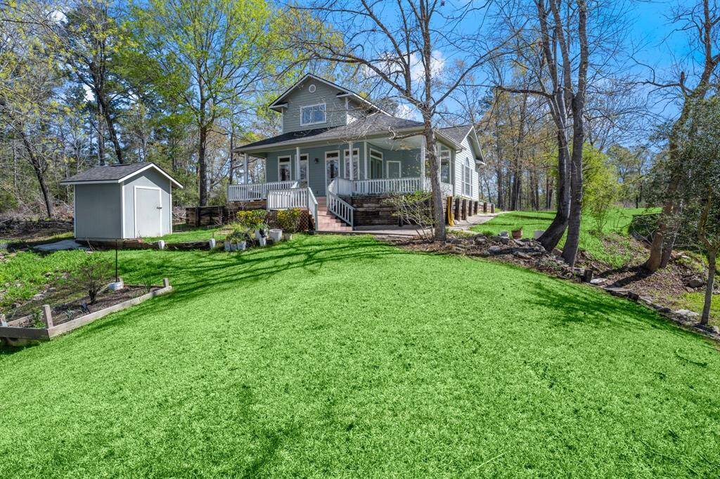 Landscaped Yard with Tall Shade Trees.