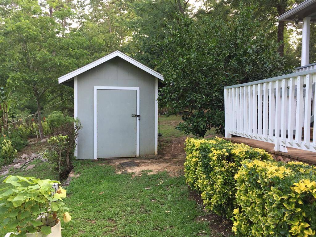 Storage building in the back yard is included.