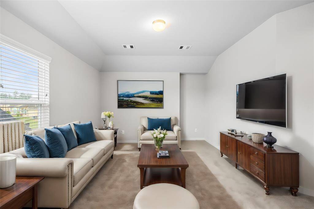 This primary bathroom is definitely move-in ready! Featuring bright cabinets with dual vanities, light countertops, spacious walk-in closet with shelving, high ceilings, custom paint, sleek and modern finishes.