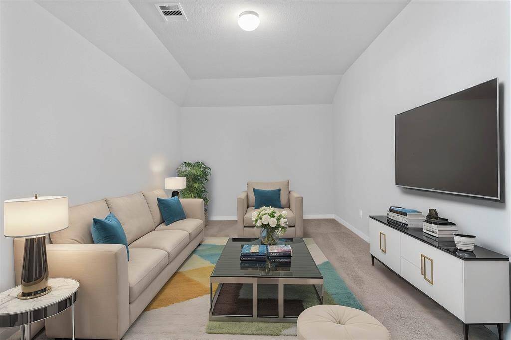 Grab the popcorn, put on a movie, and enjoy a wonderful evening in your amazing media room! Featuring plush carpet, custom paint, custom lighting makes this the perfect room for relaxing!