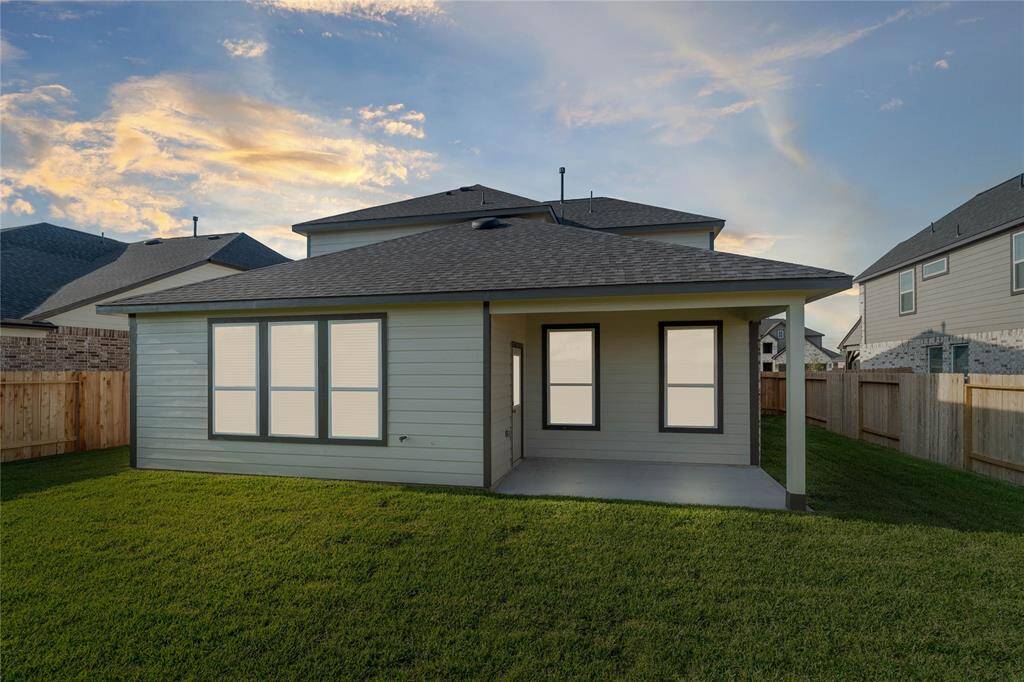 This backyard is enjoyable for everyone! From pets playing, kids jumping on the trampoline, or even having a garden, this amazing backyard provides space for endless activities for the whole family!