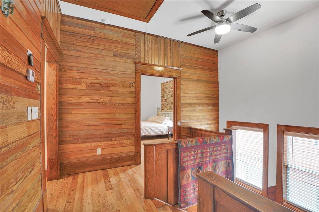 2nd floor. The wood paneling in the house is either red pine ship-lap or clap board. Also cypress bevel siding.