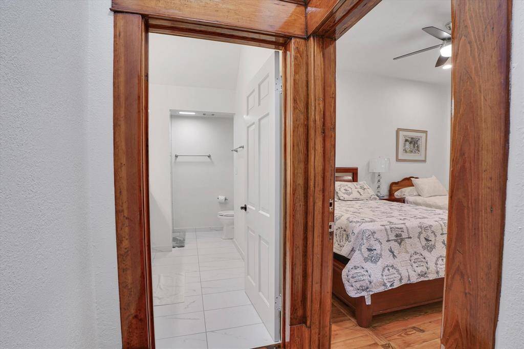 This door on the left is a common 2nd floor full bath w/a walk-in shower.