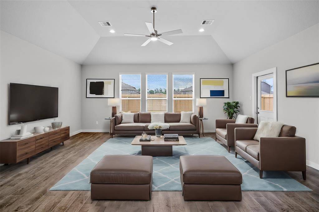 Make memories gathered around the table with your family and friends! This dining room features high ceilings, large windows, recessed lighting and gorgeous flooring.