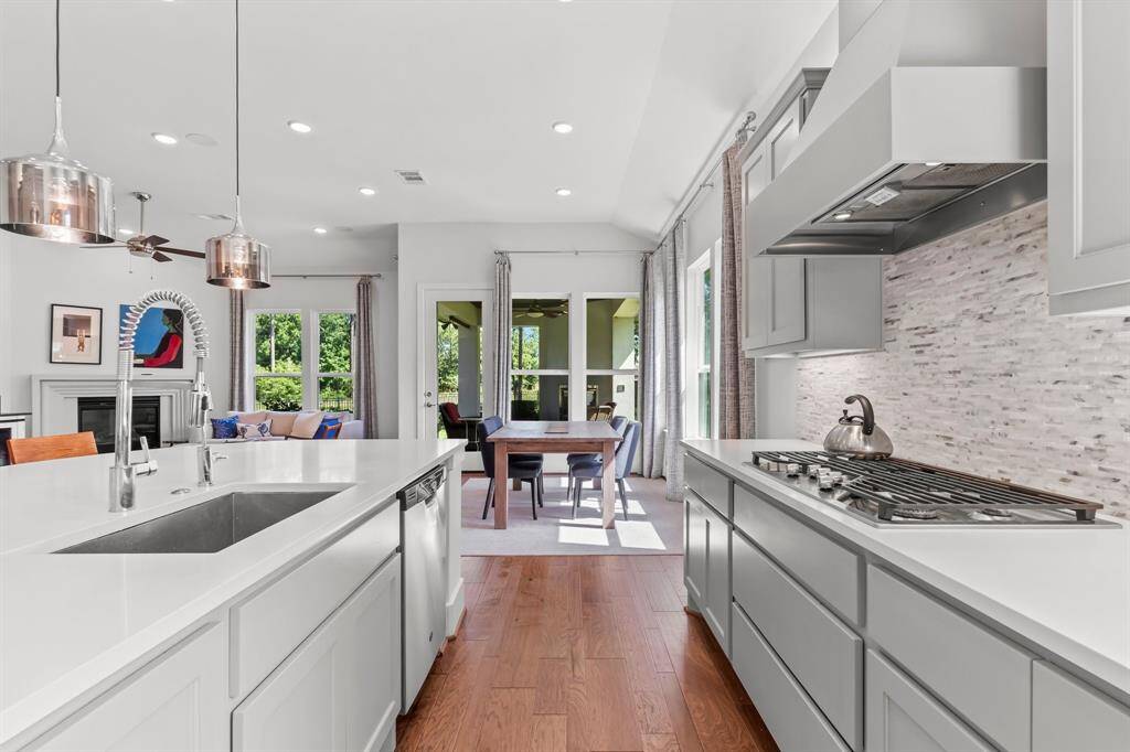 Kitchen creates a harmonous flow to living/dining area
