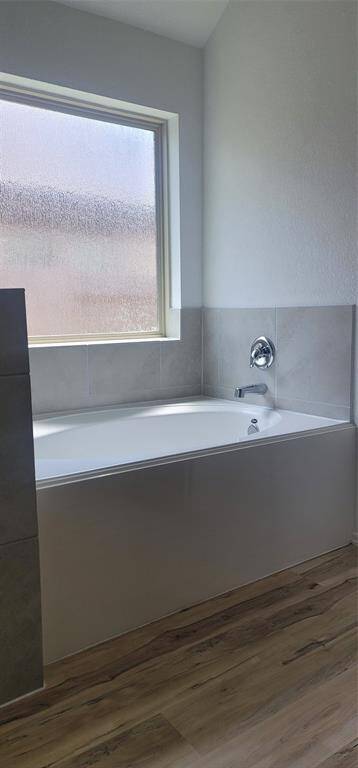 Large garden tub in the Master Suite with privicy window to allow in lots of natural light!