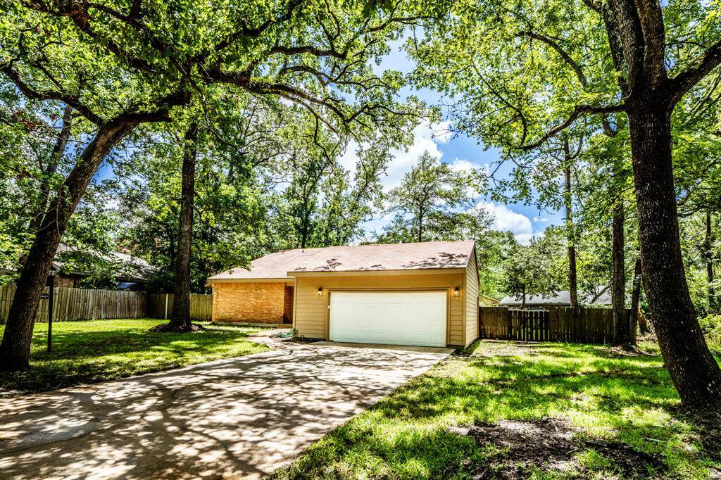 Property extends to a second lot to the right, extra private!