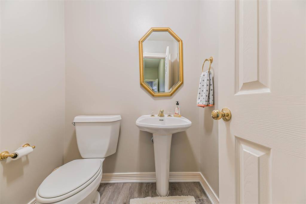 powder room in hallway off family room