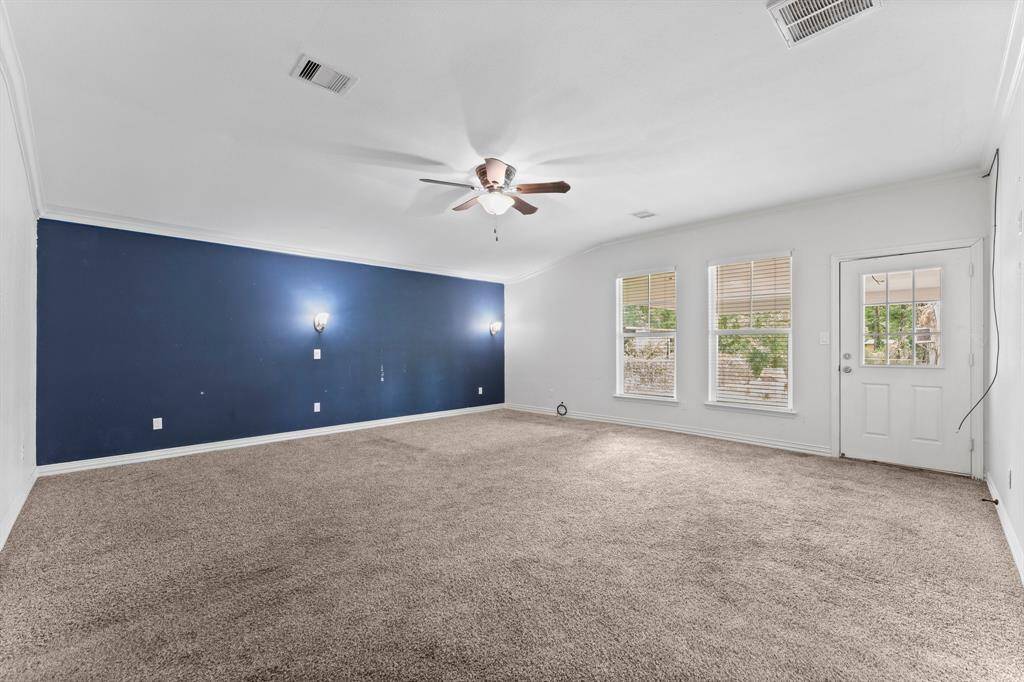 Primary bedroom is huge and allow space for a sitting area allowing space for a sitting area of office space.