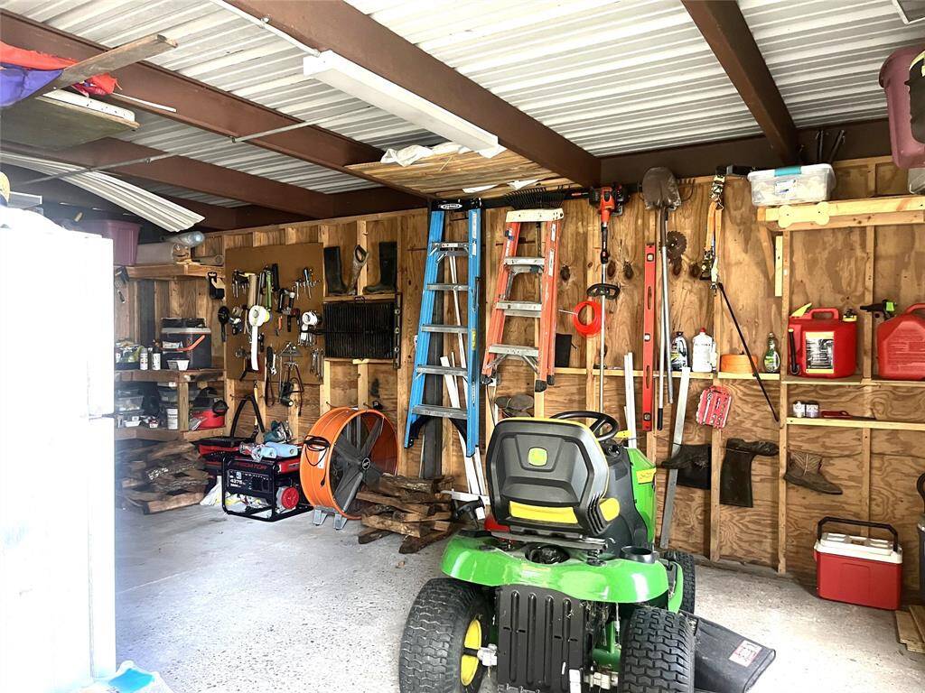 Detached workshop with concrete flooring and electricity