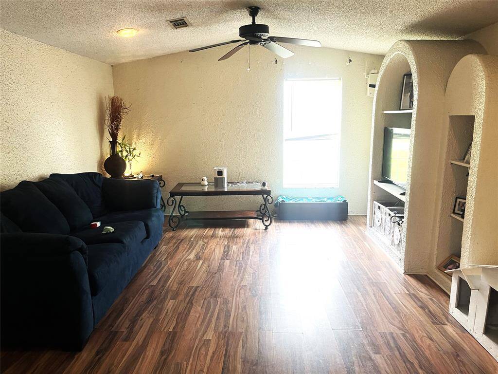 Formal living area with laminate flooring