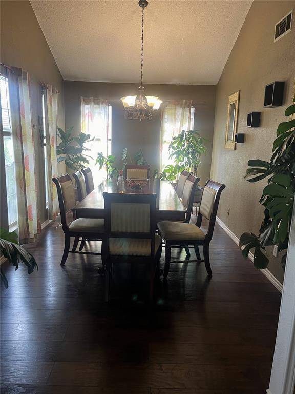 Formal dining room with laminate flooring