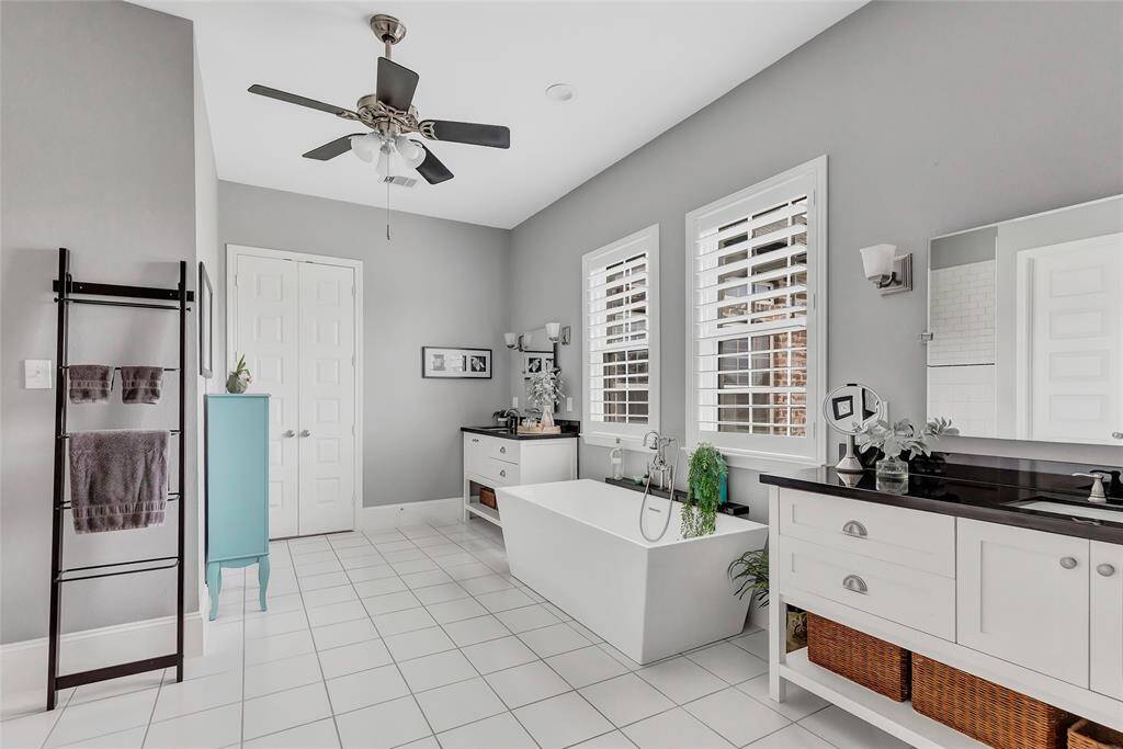 Primary bathroom features a soaker tub