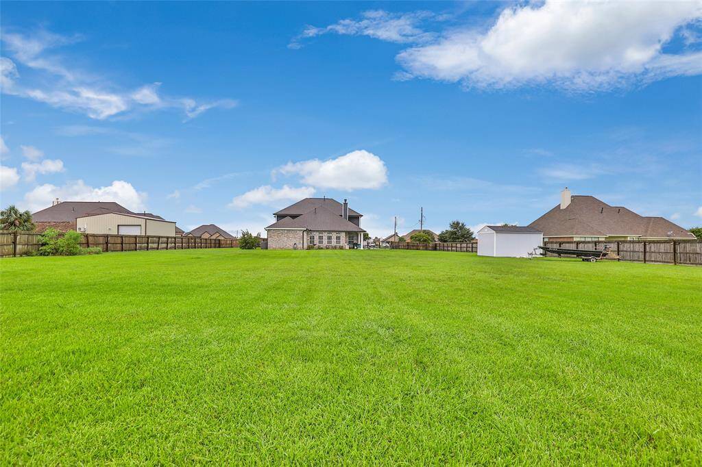 The large lot provides a blank canvas for a future pool or workshop
