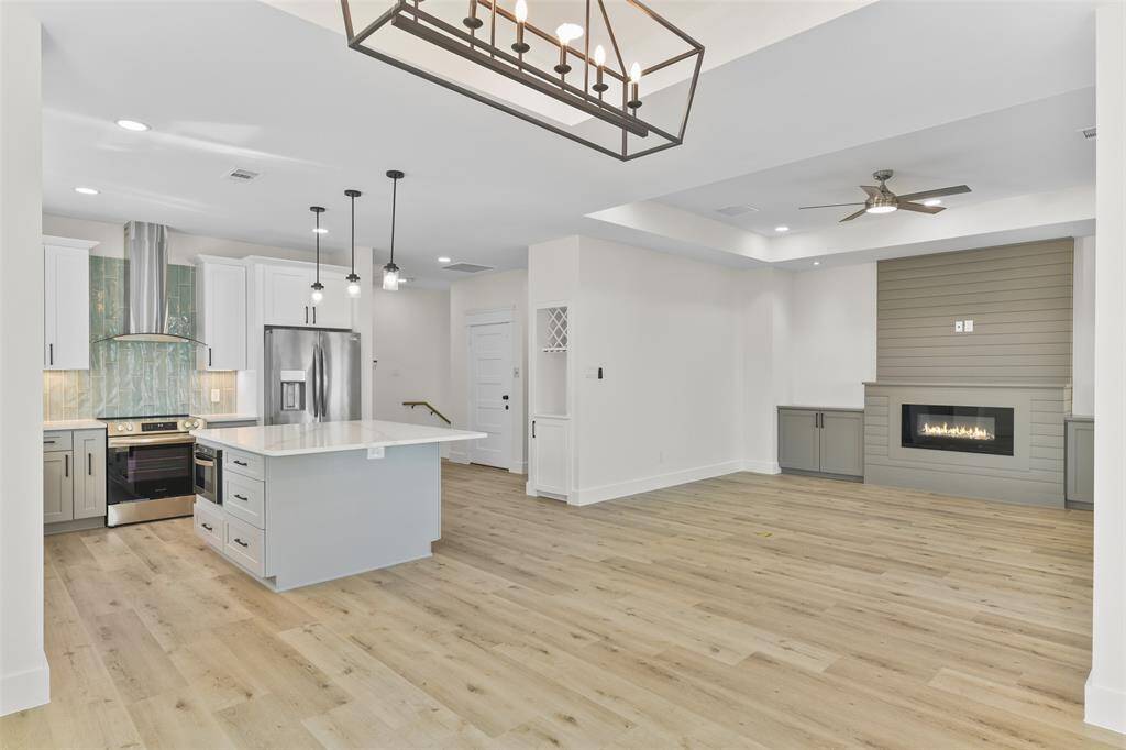 The stunning dining space is open to the kitchen and living area.